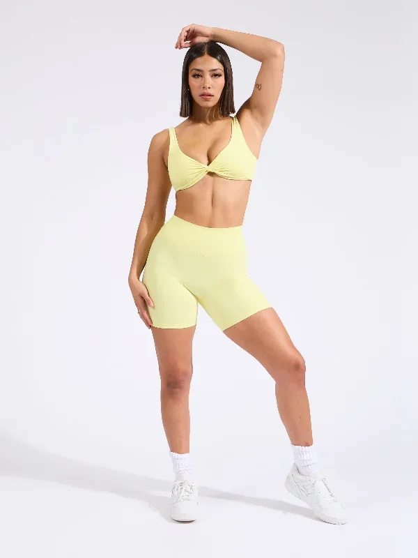 twisted-sports-bra-afterglow-yellow